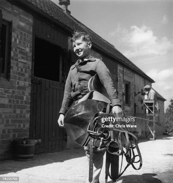 Year-old Lester Piggott at work as a stable lad, August 1948.