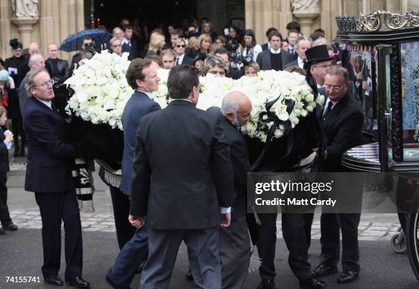 Pall bearers carry the coffin as they leave the funeral service for fashion stylist Isabella Blow, at Gloucester Cathedral on May 15 2007 in...