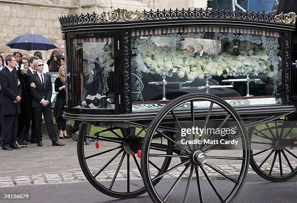 Ottis Ferry and designer Philip Treacy look on as they watch the coffin of Isabella Blow at Gloucester Cathedral on May 15 2007 in Gloucester...