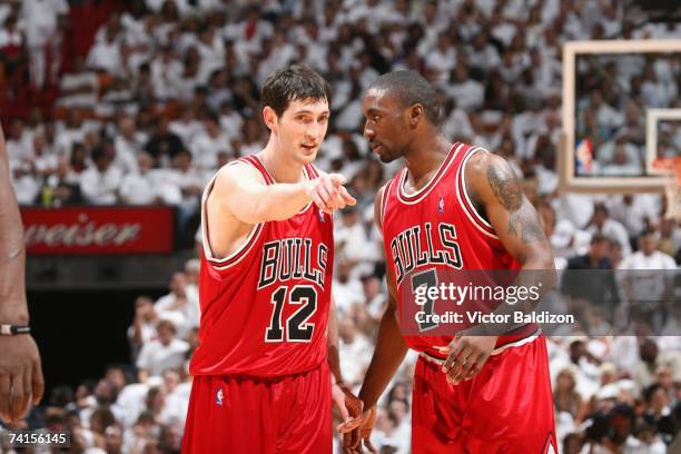 Kirk Hinrich and Ben Gordon of the Chicago Bulls talk on the court in Game Three of the Eastern Conference Quarterfinals against the Miami Heat...