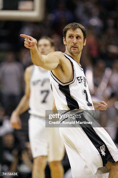 Brent Barry of the San Antonio Spurs points across the court in Game Four of the Western Conference Semifinals against the Phoenix Suns during the...