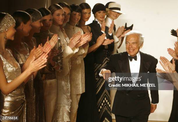 Moscow, RUSSIAN FEDERATION: US designer Ralph Lauren is greeted after his fashion show in the Spaso House, U.S. Ambassador's residence in Moscow, 15...