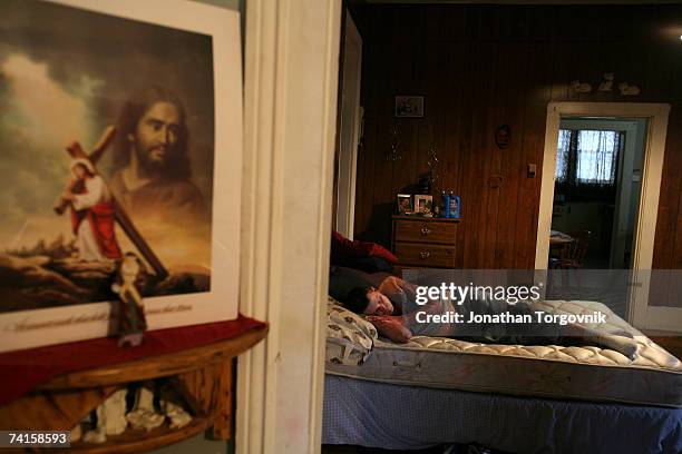 Ricky sleeping at his parents house where he lives on November 27, 2005 in Bowling Green, Kentucky. On Sunday morning Ricky , passed out and could...