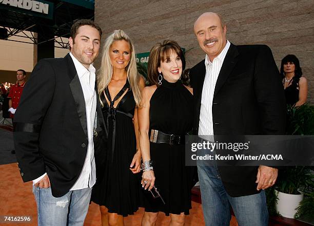 Jay McGraw, wife Erica Dahm, Robin McGraw and television personality Dr. Phil McGraw arrive at the 42nd Annual Academy Of Country Music Awards held...