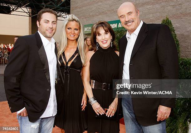 Jay McGraw, wife Erica Dahm, Robin McGraw and television personality Dr. Phil McGraw arrive at the 42nd Annual Academy Of Country Music Awards held...