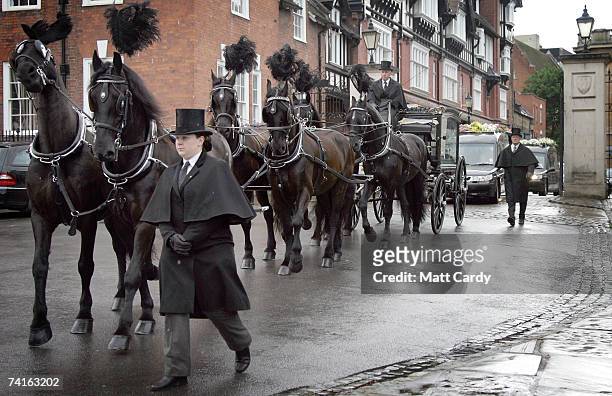 The horse drawn hearse arrives at the funeral service for fashion stylist Isabella Blow at Gloucester Cathedral on May 15 2007 in Gloucester England....