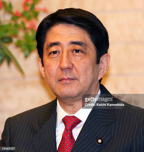 Japanese Prime Minister Shinzo Abe poses prior to receiving a Joint Statement from the President of the Science Council of Japan, Dr. Ichiro...