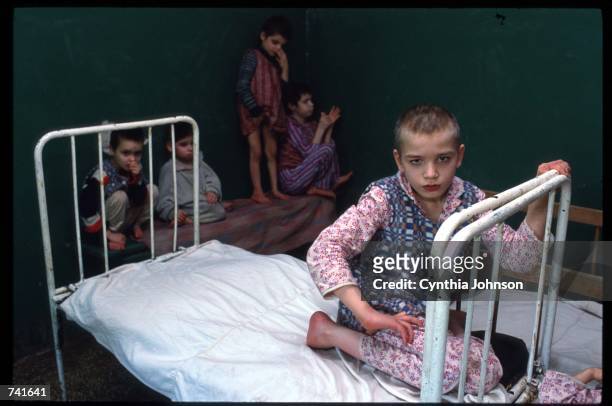 One of the numerous "irrecuperables" given up by their families to state run institutions May 15, 1990 in Romania. Under Nicolae Ceausescu policies...