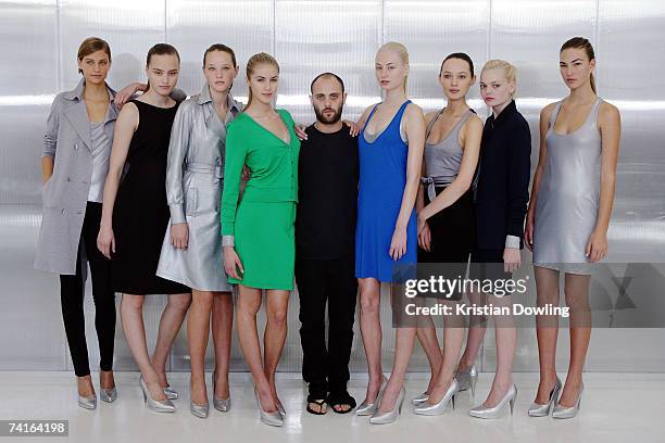 Designer Josh Goot poses with models showcasing his outfits designed for high street store Target, at the launch of his new label "Josh Goot For...