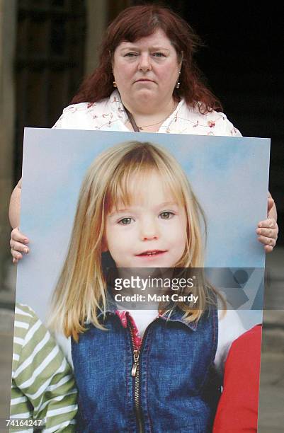 Phil McCann carries a picture of her missing niece Madeleine McCann as she visits Parliament on May 16, 2007 in London. Madeleine McCann disappeared...