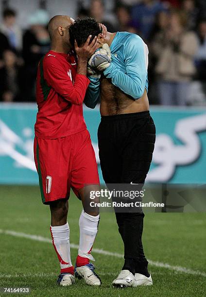 Adel Kolahkaj and Soush Makani of Iran look dejected after Iran was defeated by Australia after the Olympic Games qualifying match between Australia...