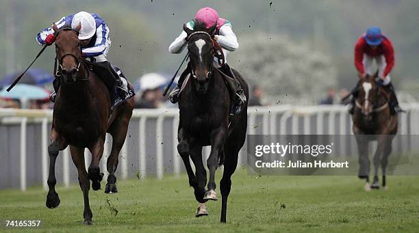 Richard Hughes and Passage Of Time get the better of the Jamie Spencer ridden Sweet Lilly to land The Tattersalls Musidora Stakes Race run at York...