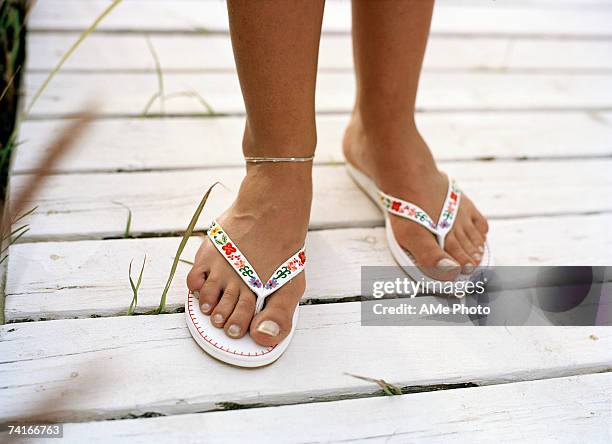 bare feet in sandals. - mens bare feet stockfoto's en -beelden
