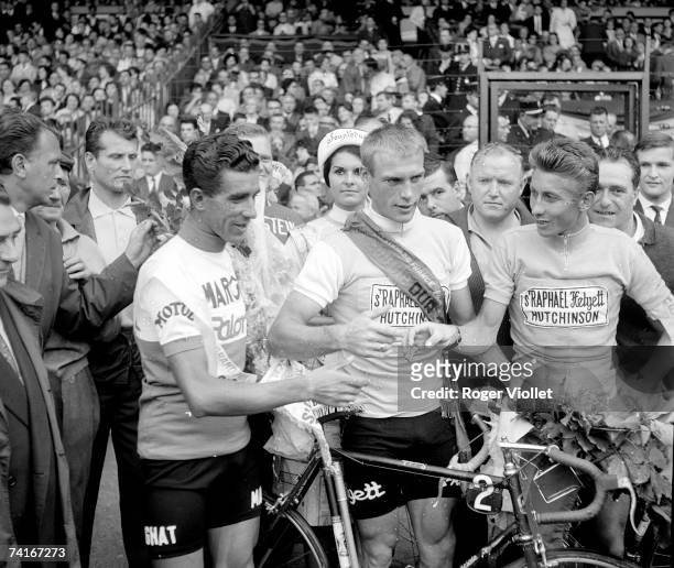 Spanish cyclist Federico Bahamontes, winner of the mountain stage, German competitor Rudi Altig, German, green jersey and Jacques Anquetil, winner of...