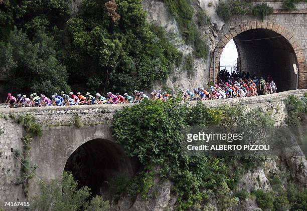 Cyclists pedal in the "Costiera Amalfitana" are pictured during the fourth stage of the Giro d'Italia cycling race, a 153 km leg from Salerno to...