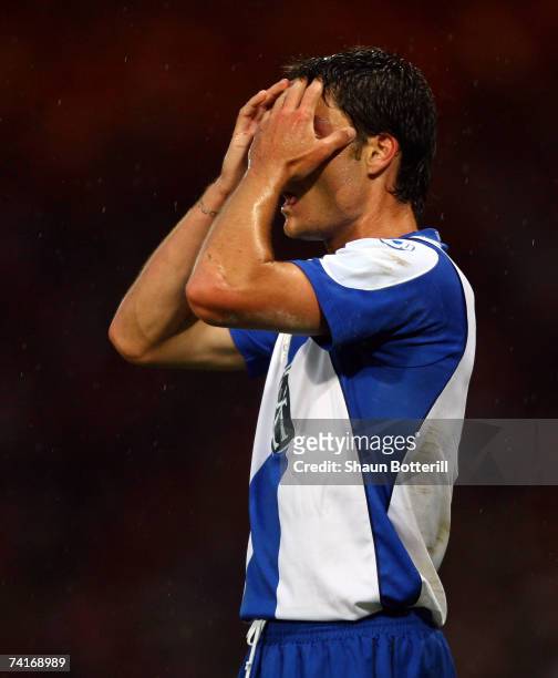 Albert Riera of Espanyol shows his dejection after Frederic Kanoute scored Sevilla's second goal of the match in extra time during the UEFA Cup Final...