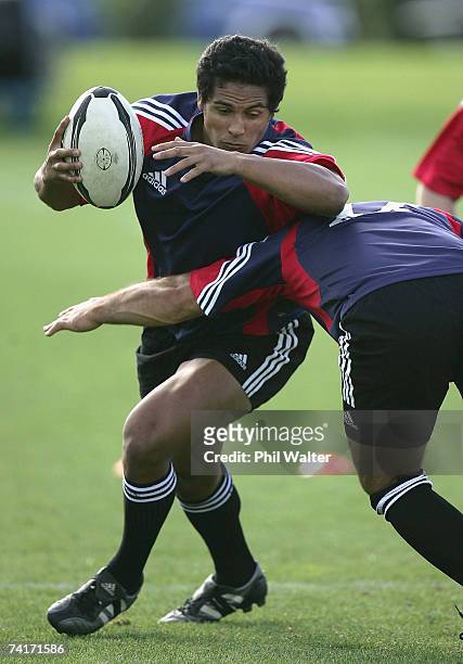 Tanerau Latimer of the New Zealand Maori is tackled during the New Zealand Maori training session at North Harbour Stadium May 17, 2007 in Auckland,...