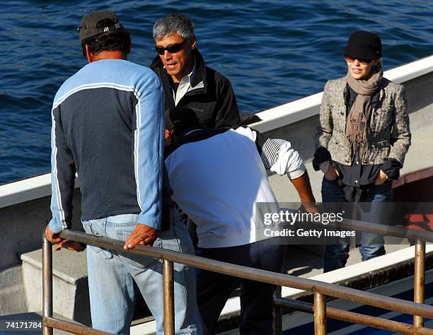 Singer Kylie Minogue and film director Alexander Dahm leave a boat during her holiday in Chile in the town of Papudo, about 190km north of Santiago,...