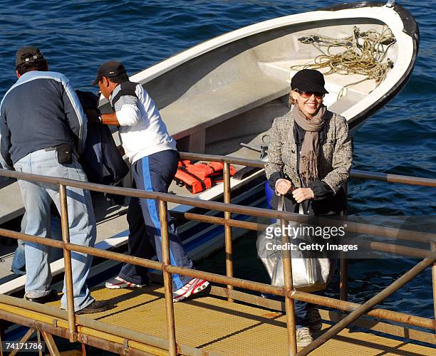 Singer Kylie Minogue is seen leaving a boat during her holiday in Chile in the town of Papudo, about 190km north of Santiago, on May 7, 2007 in...