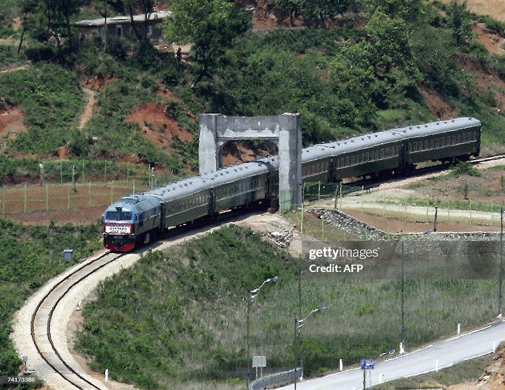 A North Korean train passes through to t...