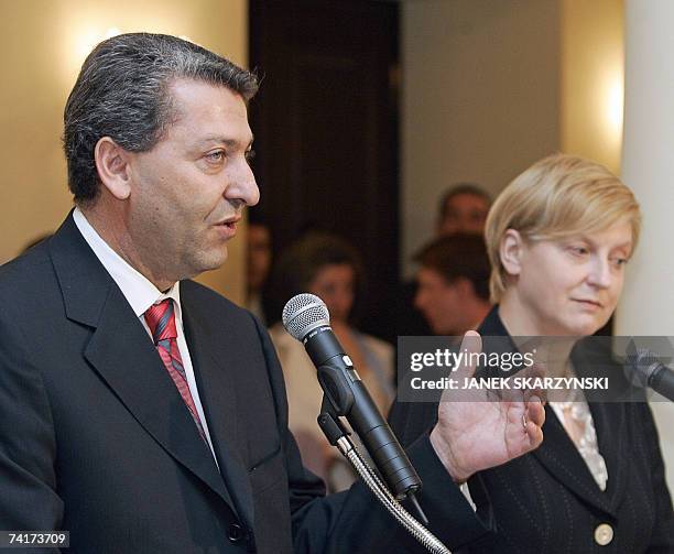 Cyprus Foreign Minister Yiorgos Lillikas gestures during a press conference with Polish counterpart Anna Fotyga during their meeting in Warsaw 17 May...