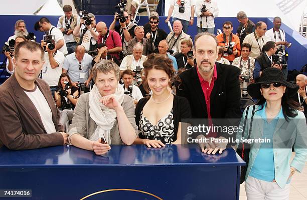 Film critic Bian Qin, script writer Kent Jones, actress Jasmine Trinca, Jury President Pascale Ferran and director Cristi Puiu attend a photocall...