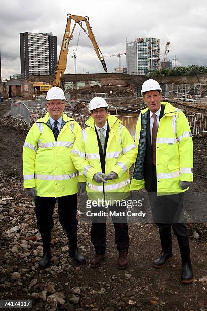 Depurt Chairman Sir Roy McNulty, Sir Sebastian Coe and the new Olympic Delivery Authority Chairman John Armitt, look at earthworks and demolition...