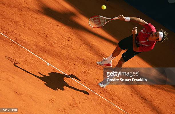 Roger Federer of Switzerland in action during his match against Juan Carlos Ferrero of Spain during day four of the Tennis Masters Series Hamburg at...