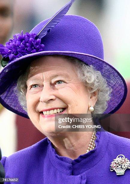 London, UNITED KINGDOM: Britain's Queen Elizabeth II visits Lords Cricket Ground, in London during the first Test between England and West Indies at...