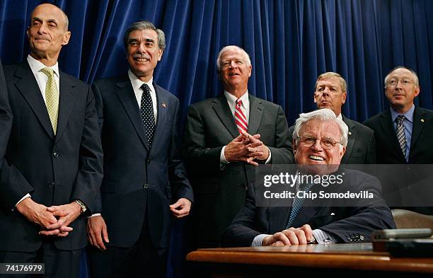 Senator Ted Kennedy enjoys a laugh with Homeland Security Secretary Michael Chertoff, Commerce Secretary Carlos Gutierrez, Sen. Saxby Chambliss ,...