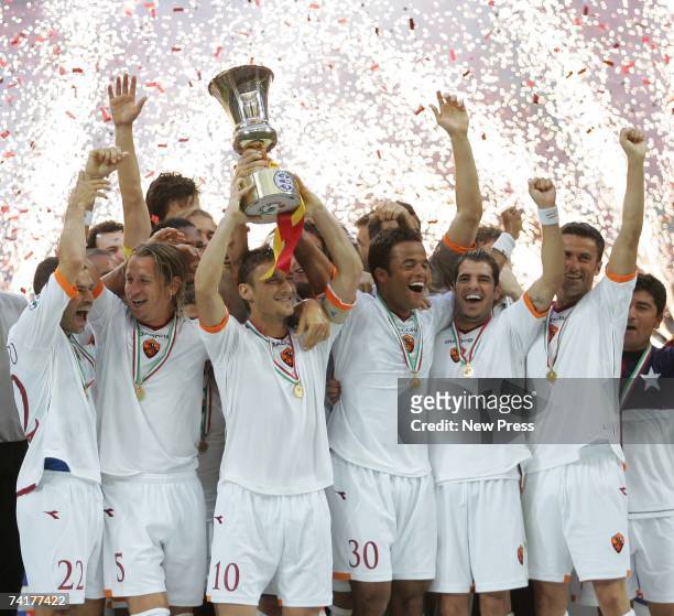 The Roma team celebrate winning the Coppa Italia after the Coppa Italia final, second leg match between Internazionale and Roma at the Stadio...