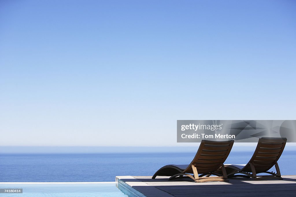 Folding chairs on infinity pool deck
