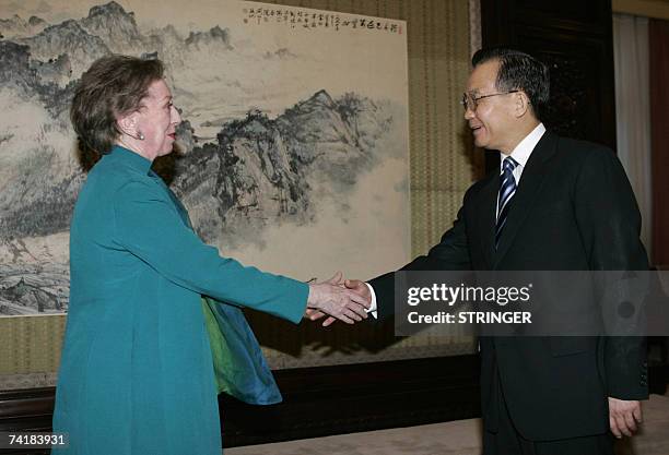 China's Premier Wen Jiabao shakes hands with Britain's Foreign Secretary Margaret Beckett at Zhongnanhai in Beijing, 18 May 2007. British Foreign...