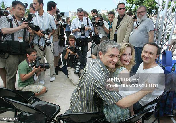 Russian actor Konstantin Lavronenko, Swedish actress Maria Bonnevie and Russian director Andrei Zviaguintsev pose during a photocall for their film...