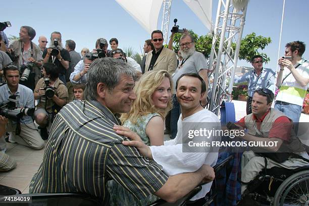 Russian actor Konstantin Lavronenko, Swedish actress Maria Bonnevie and Russian director Andrei Zviaguintsev pose during a photocall for their film...