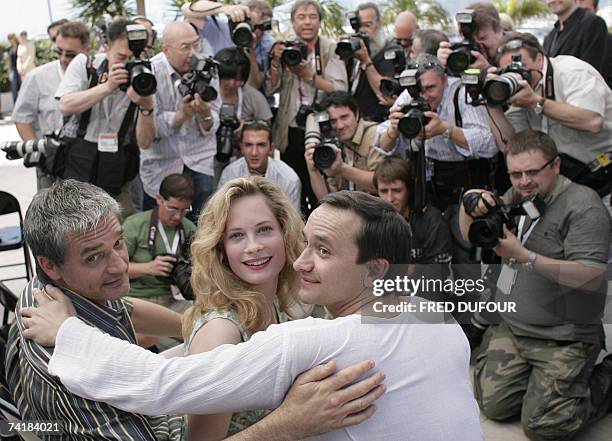 Russian actor Konstantin Lavronenko, Swedish actress Maria Bonnevie and Russian director Andrei Zviaguintsev pose during a photocall for their film...