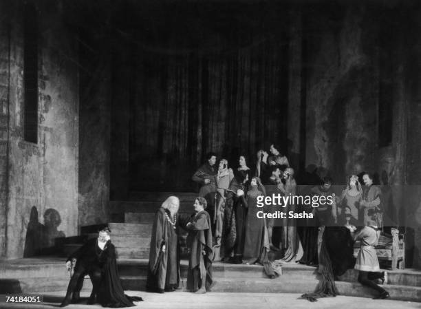 American actor John Barrymore , in his first appearance in England, as Hamlet at the Haymarket Theatre, London, 1925. Immediately to his left are...