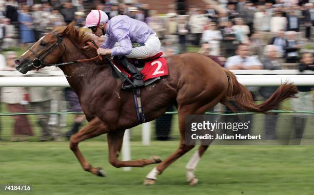 Steve Drowne and Sakhee's Secret land The Ultimate Travel Stakes Race run at Newbury Racecourse on May 18 in Newbury, England.