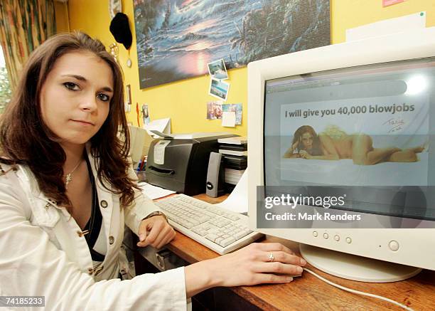 Tania Derveaux poses with a computer showing her campaign poster on May 18, 2007 in Antwerp, Belgium. The Belgian politician of the Nee party has...
