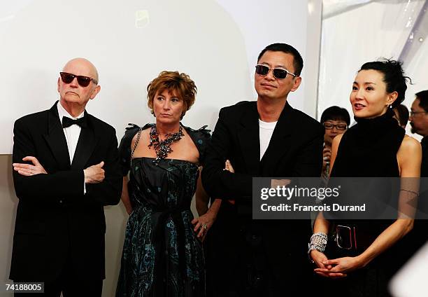 Gilles Jacob, president of Cannes Film Festival, General Director Catherine Demier, director Wong Kar Wai and actress Maggie Cheung attend the Hong...