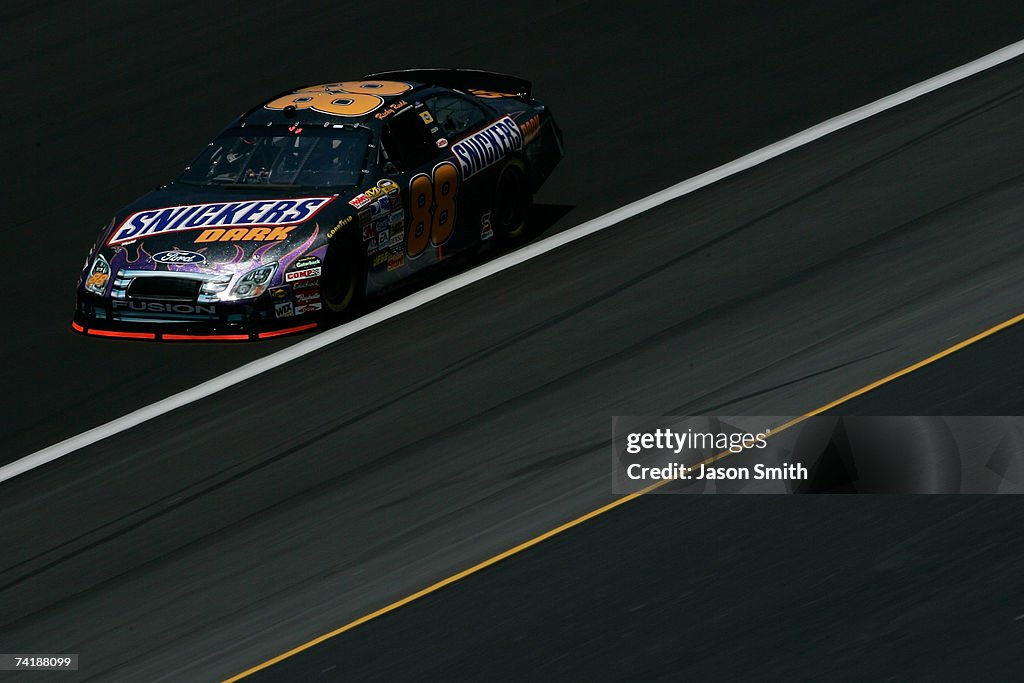 Snickers Dark Car Ricky Rudd Ricky Rudd, driver of the Snickers Dark Ford, drives during practice ...