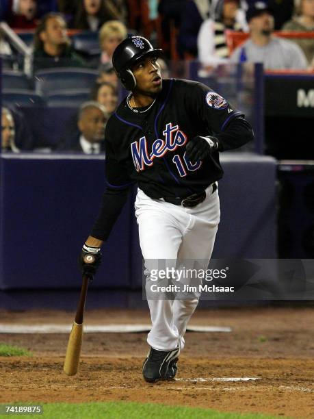 Endy Chavez of the New York Mets watches his two run blast in the fifth inning against the New York Yankees during their game at Shea Stadium May 18,...