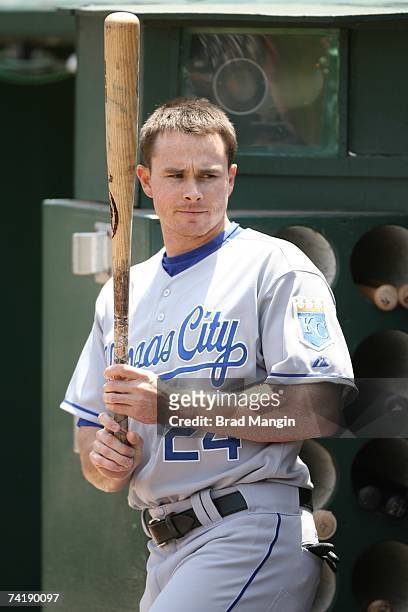 Mark Teahen of the Kansas City Royals gets ready in the dugout before the game against the Oakland Athletics at the McAfee Coliseum in Oakland,...
