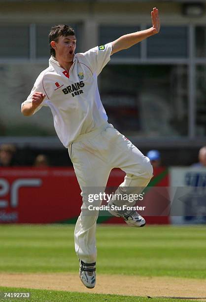 Glamorgan bowler James Harris celebrates after taking the wicket of Gloucestershire batsman Steve Adshead, becoming the youngest bowler to take 10...