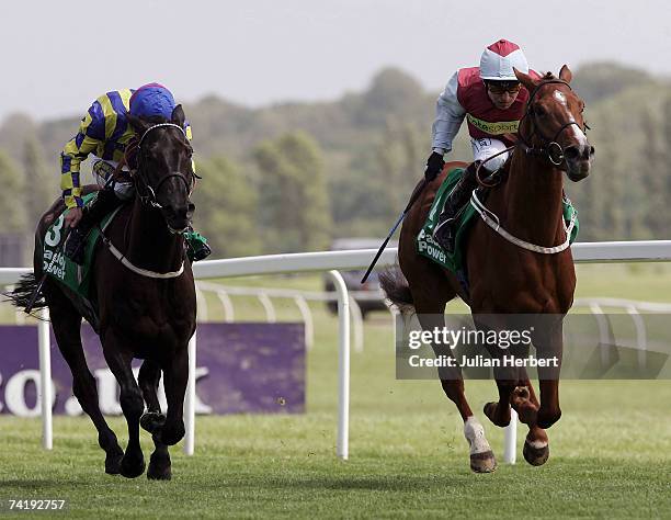 Kevin Darley and Peppertree Lane lead the Steve Drowne ridden Group Captain to land The paddypower.com Stakes Race run at Newbury Racecourse on May...