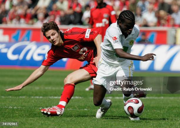 Tinga of Borussia Dortmund callenges Pirmin Schwegler of Bayer 04 Leverkuseny during their Bundesliga match at the BayArena on May 19, 2007 in...