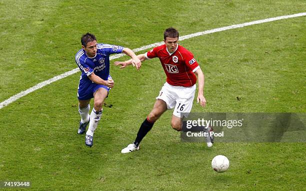 Manchester United's Michael Carrick and Chelsea's Frank Lampard in action during the FA Cup Final match sponsored by E.ON between Manchester United...