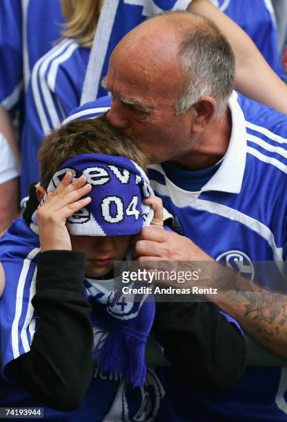 Fans of Schalke cry during the Bundesliga match between Schalke 04 and Arminia Bielefeld at the Veltins Arena on May 19, 2007 in Gelsenkirchen,...