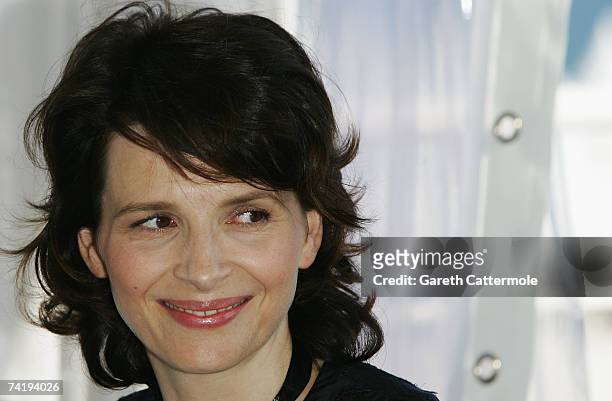 Actress Juliette Binoche attends a press conference promoting the movie 'Certified Copy' at the Grand Hotel during the 60th International Cannes Film...