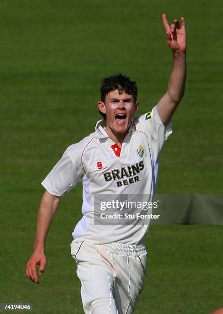 Glamorgan bowler James Harris celebrates after taking the wicket of Gloucestershire batsman Mark Hardinges and in the proccess becoming the youngest...